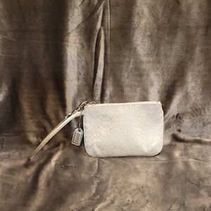 Elegant Coach White and Silver Wristlet